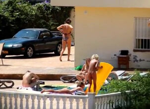 Family nudist pool party